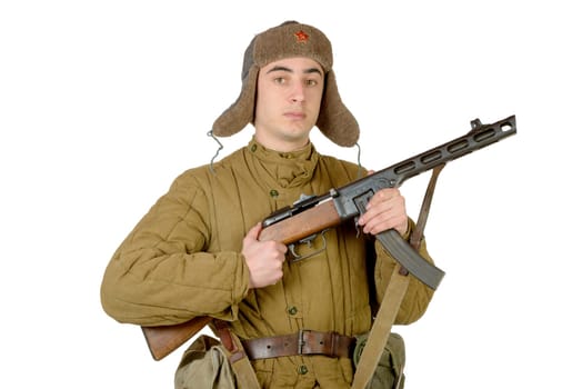 young Soviet soldier with machine gun on the white background
