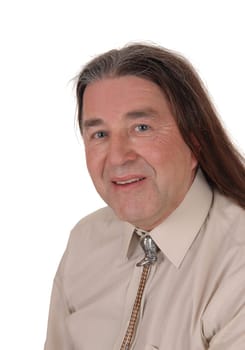 A handsome indigenous man smiling in a portrait image with his.long brunette hair, isolated for white background.
