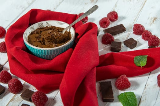 Homemade chocolate mousse with the  fresh raspberry