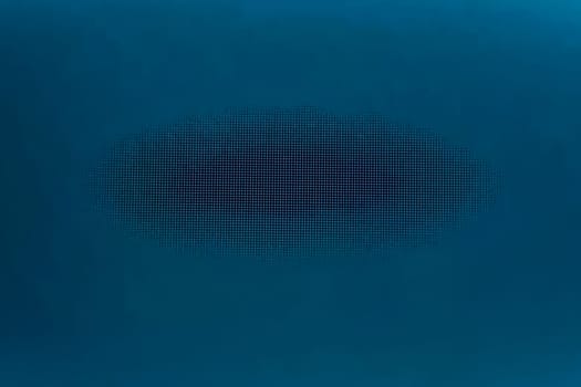 Blue background with dots in the center.