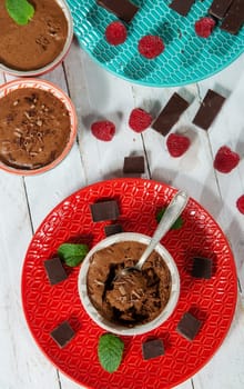 Homemade chocolate mousse with the fresh raspberry