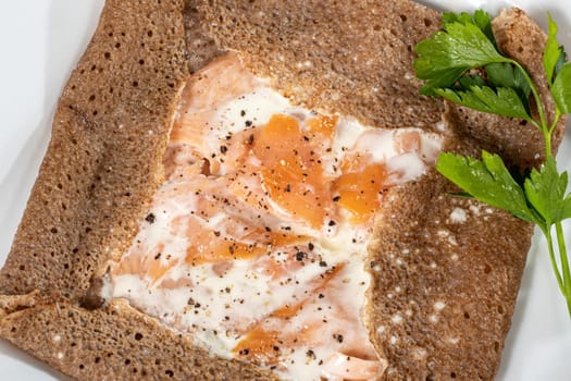 an homemade Breton crepe with egg