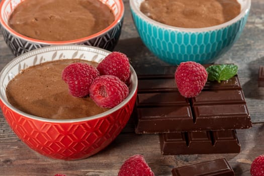 Homemade chocolate mousse with the  fresh raspberry