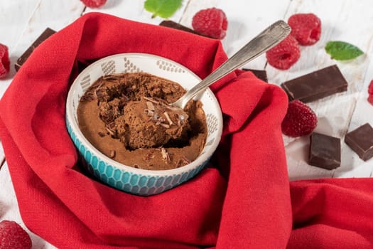 Homemade chocolate mousse with the fresh raspberry