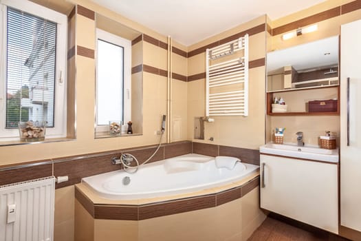modern bathroom in the apartment. A glass shower door. High quality photo