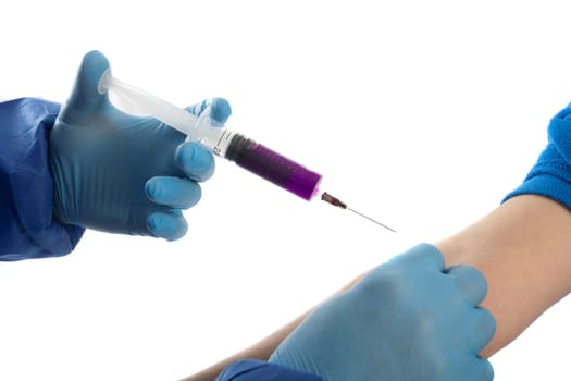 doctor in protective gloves give vacina to women
