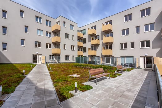 A large brick building with. A large brick building with. Czech Republic, city Hradec Kralove. High quality photo