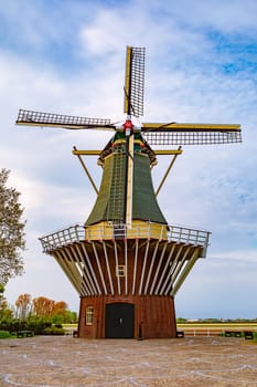 Windmill in the park. Spring in the Netherlands