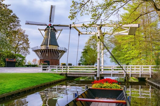 Windmill in the park. Spring in the Netherlands