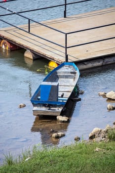 boat moor floating walkway river sunny day calm water