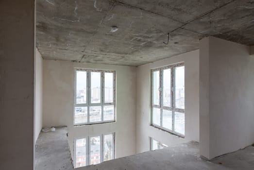 View of the windows of the second light in the apartments without repair from the developer