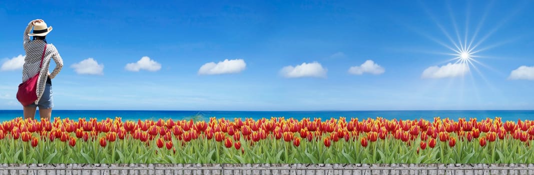The 3d rendering of Tulip field beside with sea view and bright sky