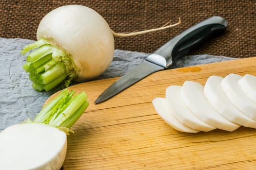 Sliced daikon radish.Tasty fresh crude white round japanese radish.