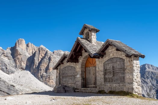 A small church in the Dolomites. The Dolomites of Brenta group, Italy