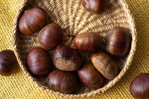 Fresh edible chestnuts in a basket