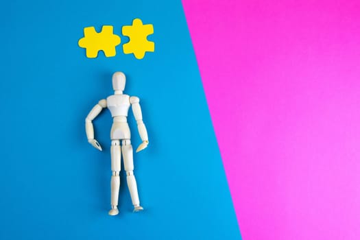 Lemon, ginger, and chapel against multi-colored tablets. The concept of choosing a healthy diet versus taking medication. Top views with clear space