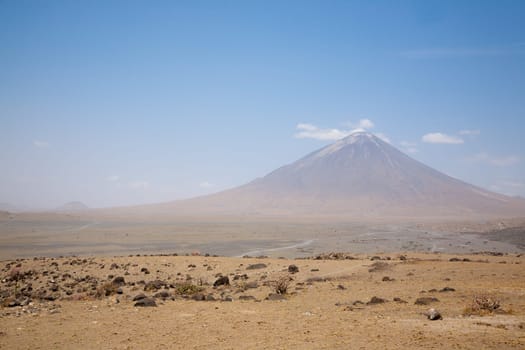 Lake Natron area landscape, Tanzania, Africa. Ol Doinyo Lengai volcano. Mountain of God. African panorama