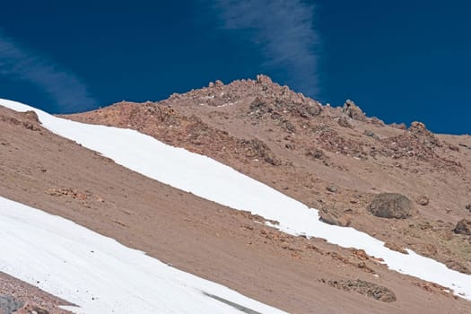 Snow and Bare Rock on a Mount Lassen in Lassen Volcanic National Park in California