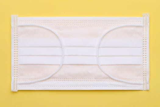 white air protection mask on the color background
