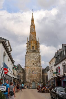 Carnac, France, July 7, 2019: Route de Saint-Cornely and church Saint-Cornely, Carnac, Brittany, France