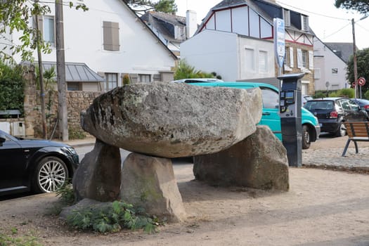 Carnac, France, August 1, 2019: Dolmen the Carnac-Plage in the center of city, Carnac, Brittany, France