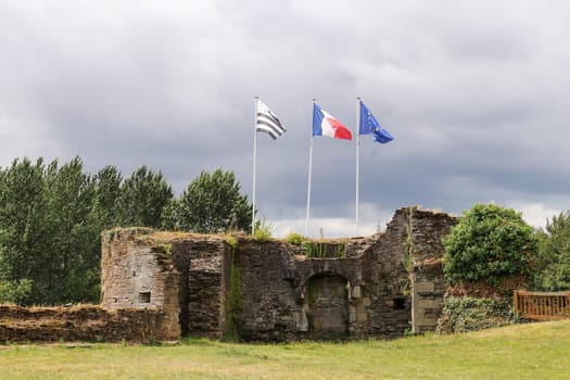 Corlay, France - August 6, 2019: Ruins of medieval castle in Corlay village, Brittany, Cotes-d'Armor, France