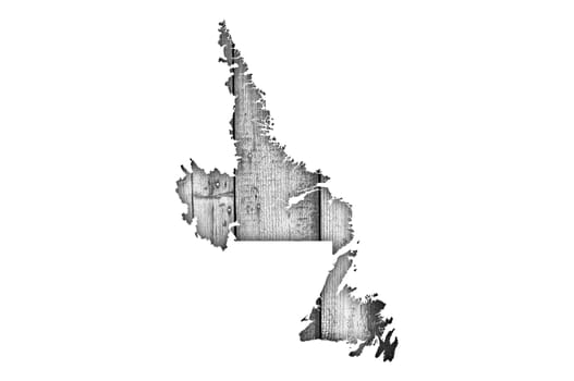 Map of Newfoundland and Labrador on weathered wood