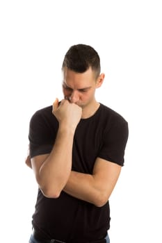 Photo of thoughtful man isolated over white background wall. Looking aside.