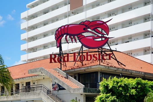 American shop sign where is inscribed Red Lobster in the shop mall of the American village of Chatan City in Okinawa island where Distortion Seaside, Oak Fashion and Depot Island Seaside are located