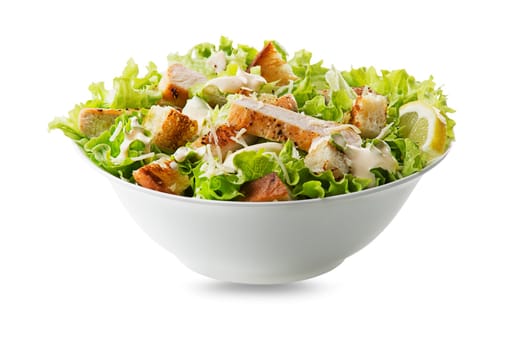 Chicken Salad. Chicken Caesar Salad. Caesar Salad with grilled chicken and croutons. Grilled chicken breast and fresh green salad isolated on white