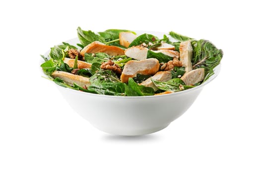 Healthy green salad with chicken breast and nuts isolated on white background