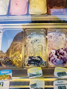 PREROW ON THE DARS - AUGUST 03, 2018: View from above into the display of an ice cream parlor with different types of ice cream.