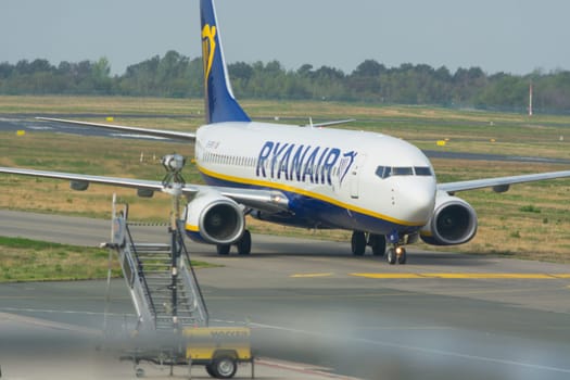 WEEZE, NRW, GERMANY - SEPTEMBER 11, 2018:.Airplane of the airline Ryanair on the runway of Weeze airport.
