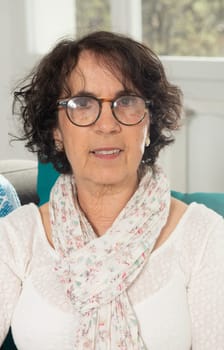 portrait of a beautiful brunette senior woman