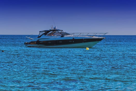 Paguera, MALLORCA, SPAIN - MAI 31, 2016:.View of the Bay of Paguera with pleasure boat in azure water, Mallorca, Spain.