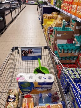 ESSEN, NRW, GERMANY - MAY 23, 2018:..Essen, Nrw, Germany - May 23, 2018: Shopping with shopping cart in a supermarket, discounter in Germany