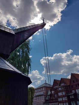 LUNNEBURG, LOWER SAXONY, GERMANY - JULY 27, 2018:..Luenburg - Julli 27, 2018:.Old harbor and crane in the historic center of Luneburg, Germany