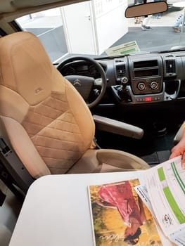 DUESSELDORF, NRW, GERMANY - AUGUST 29, 2018:.Interior with a view of the cockpit of a motor home on a show. Concept freedom, family vacation trip, holiday trip with camper.
