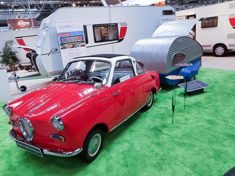 DUESSELDORF, NRW, GERMANY - AUGUST 29, 2018:.Motorhomes and campers for sale or rent at an exhibition. Concept freedom, family vacation trip, holiday trip with camper.