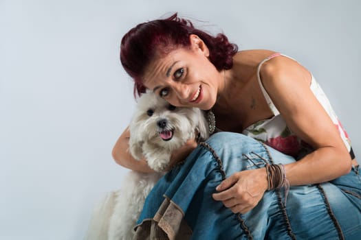 woman posing with her dog