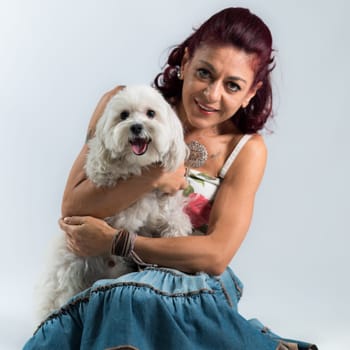 woman posing with her dog