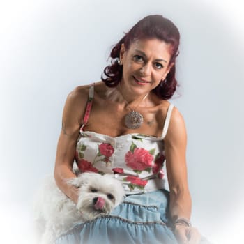 woman posing with her dog