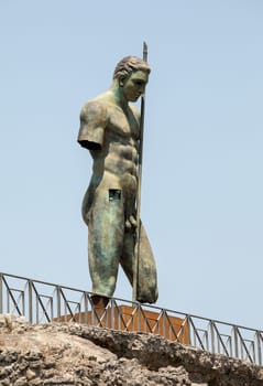 Pompeii, Italy - June 15, 2017: Sculptures of the Polish sculptor Igor Mitoraj on display at Pompeii archaeological site, the ancient Roman city, destroyed in 79 BC by the eruption of Mount Vesuvius.