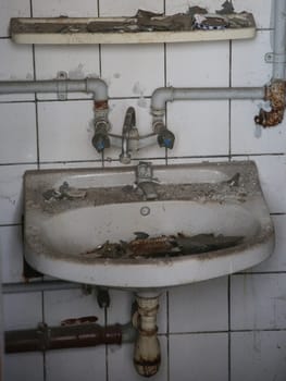 dirty sink with water connection