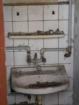 dirty sink with water connection