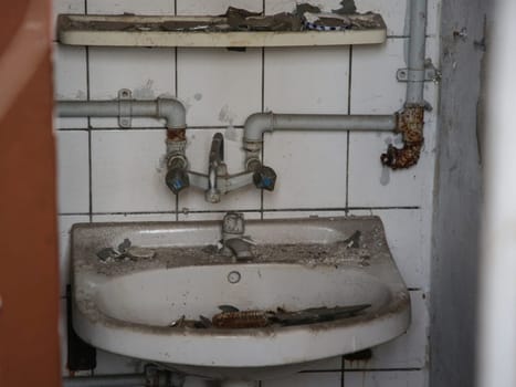 dirty sink with water connection