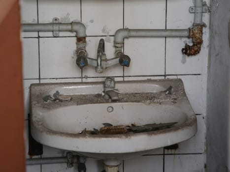 dirty sink with water connection