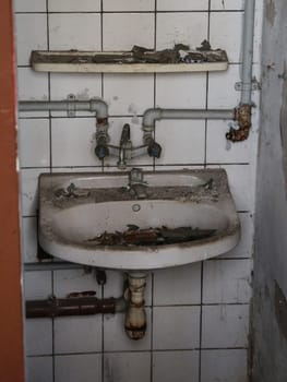 dirty sink with water connection
