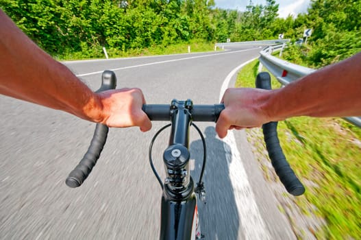 Road cycling wide angle speed shoot. Landscape cycling in road