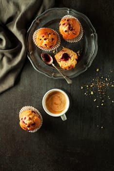 Served dessert with muffins cake and coffee. Continental breakfast table